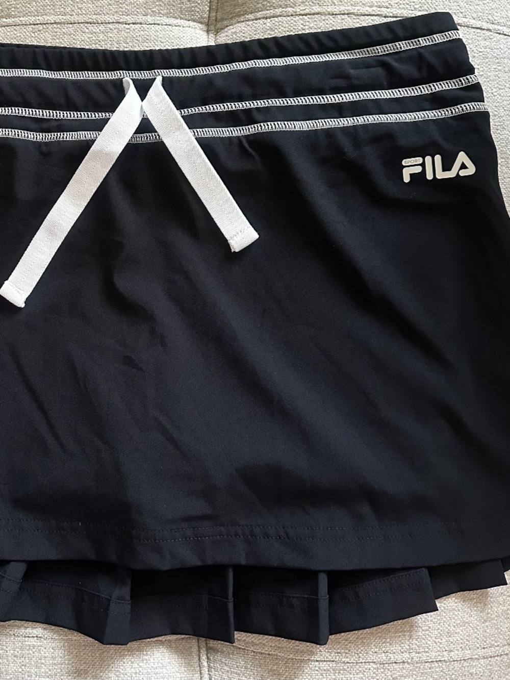^Fila Tennis/Golf/Running Skort". Black & White Size Lg